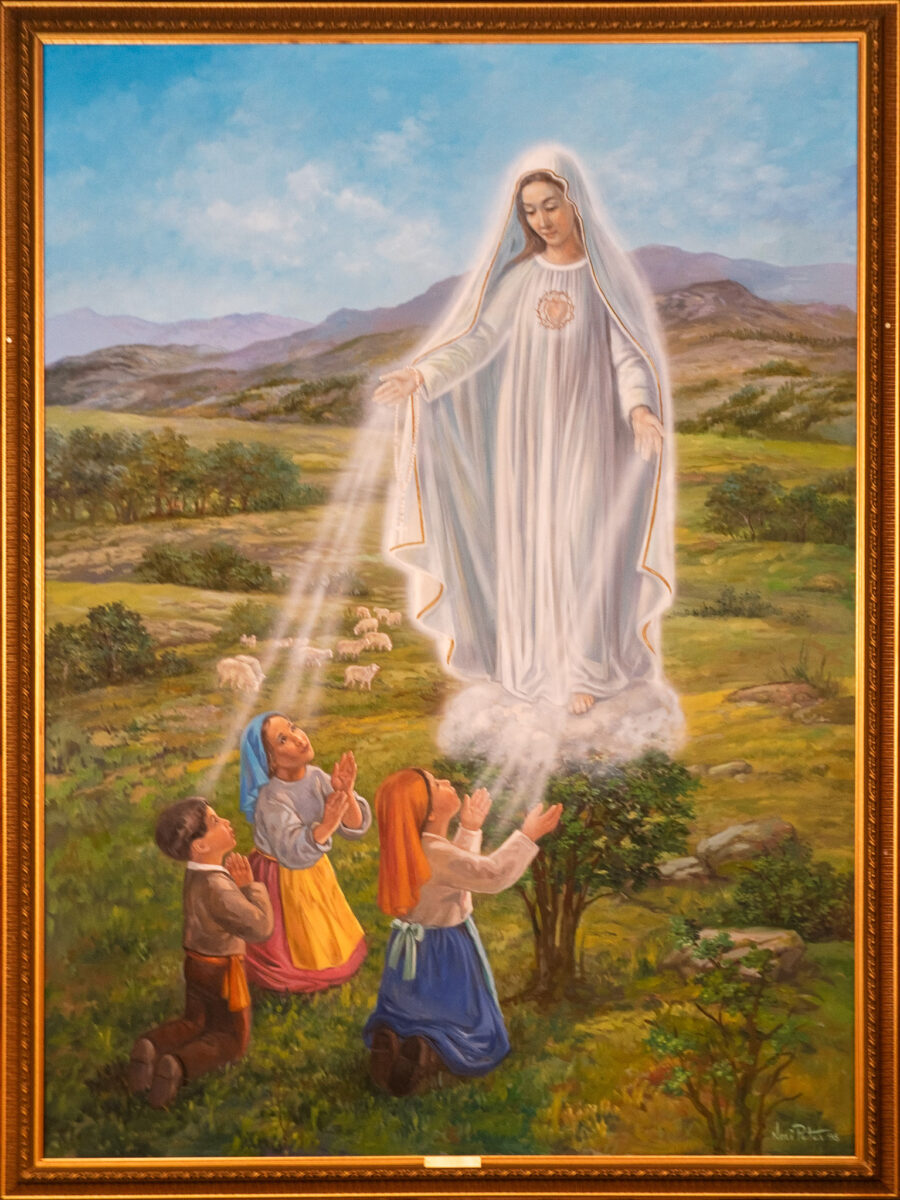 Our Lady of Fatima apparition painting photographed by Duarte Faria at Our Lady of Fatima Church, Minden, Ontario – Catholic religious art photography.